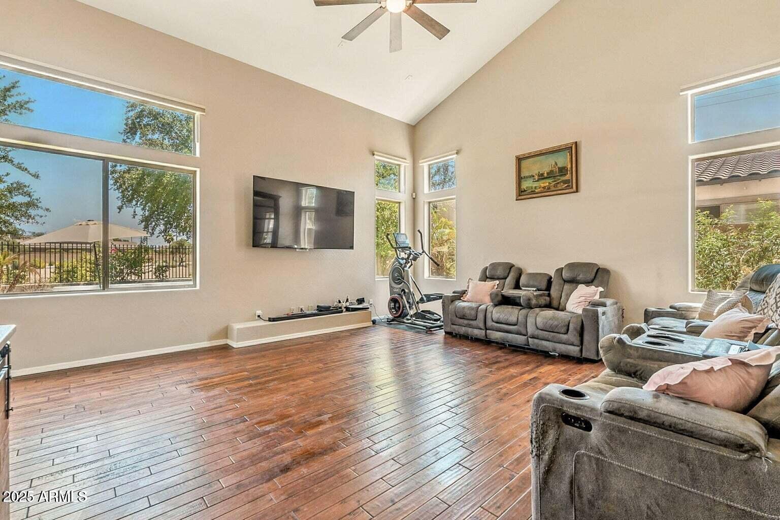 7169 South Dodane Court Gilbert, AZ 85298 - Photo 3 of 23 a living room with furniture and a large window