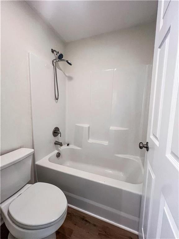 6590 Old Still Trail Gainesville, GA 30506 - Photo 13 of 17 a bathroom with a toilet and a bathtub