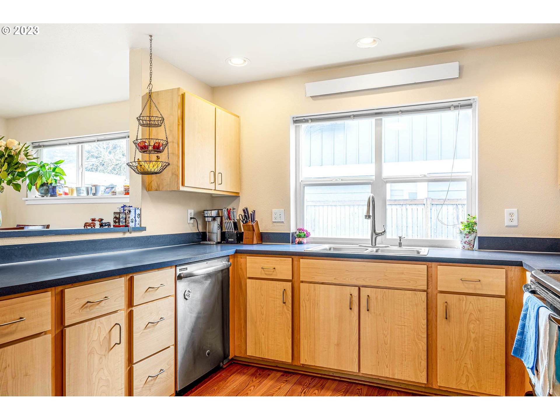 1709 Fairhaven Drive Springfield, OR 97477 - Photo 11 of 26 a kitchen with white cabinets and sink
