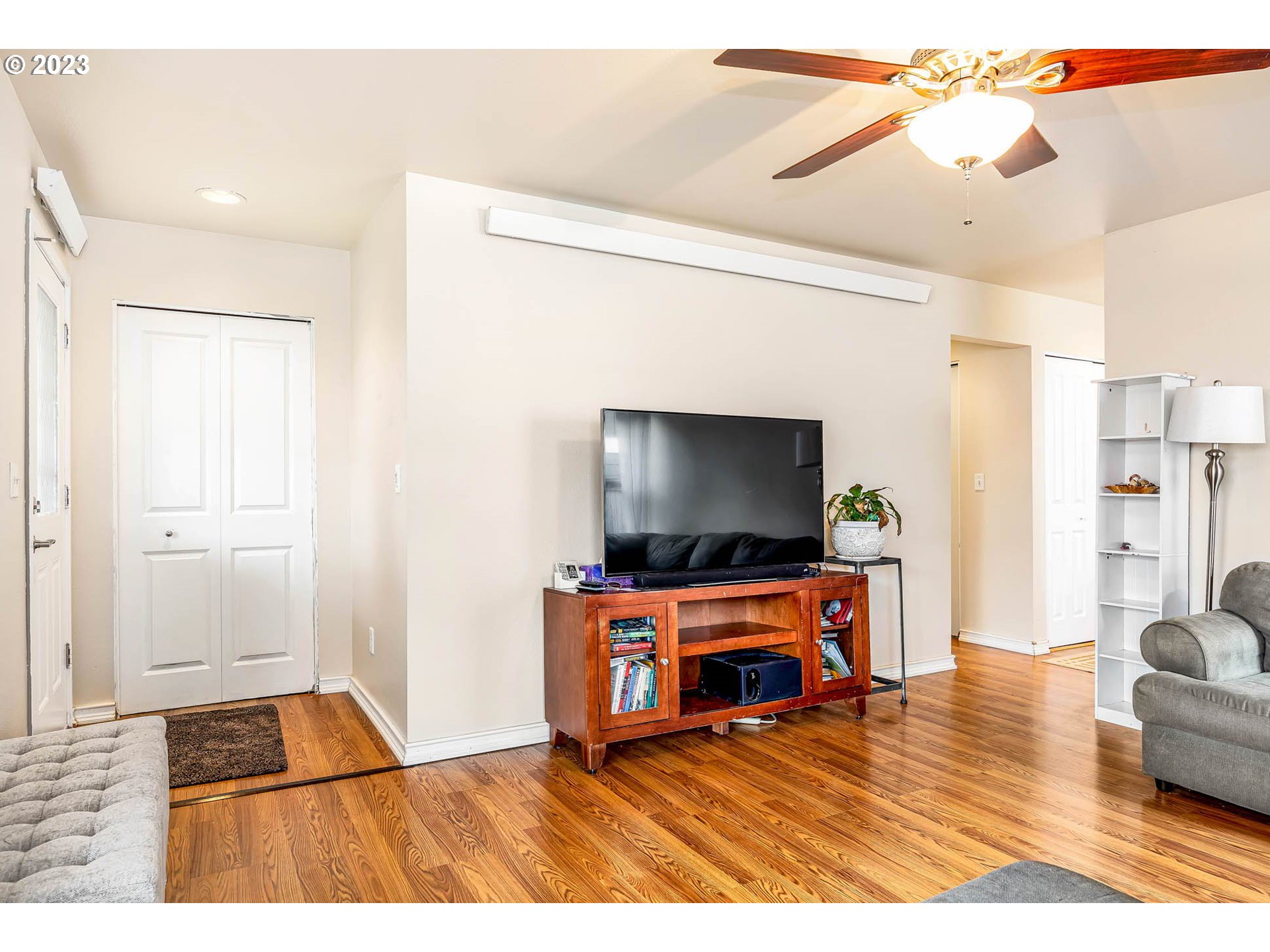 1709 Fairhaven Drive Springfield, OR 97477 - Photo 6 of 26 a living room with furniture and a flat screen tv