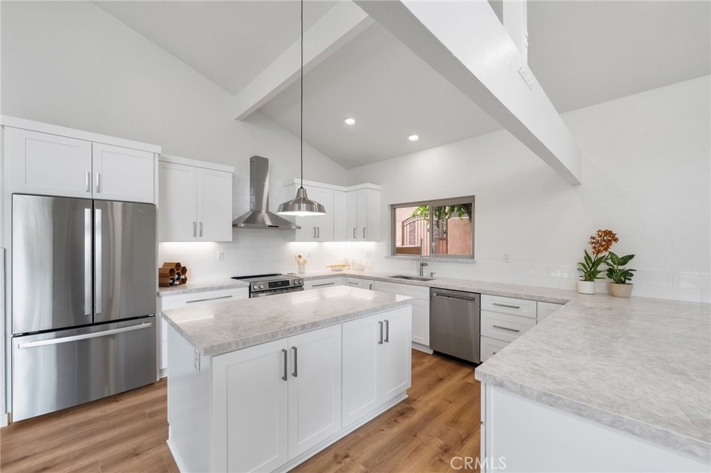 41070 Avenida Verde Temecula, CA 92591 - Photo 15 of 70 a kitchen with a sink stove and refrigerator