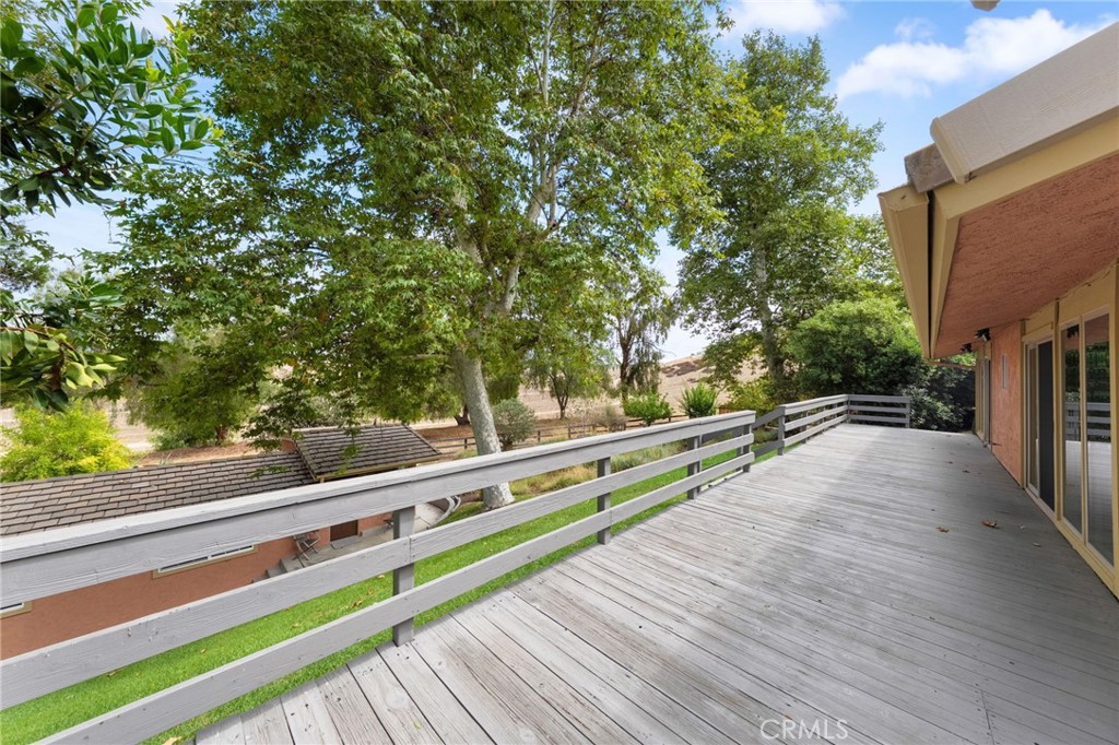 41070 Avenida Verde Temecula, CA 92591 - Photo 42 of 70 a view of a balcony with wooden floor and fence
