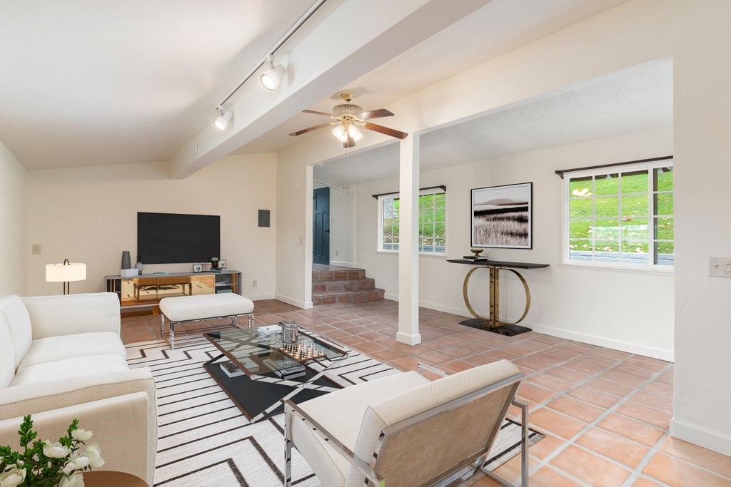 41070 Avenida Verde Temecula, CA 92591 - Photo 54 of 70 a living room with furniture and a flat screen tv