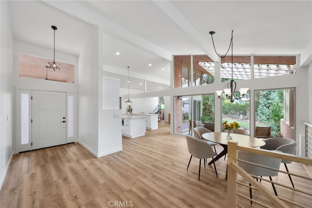 41070 Avenida Verde Temecula, CA 92591 - Photo 10 of 70 a living room with furniture and a chandelier