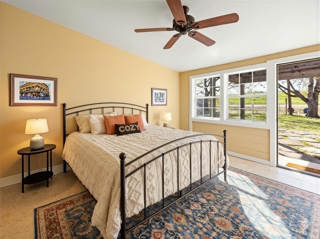 817 Edgefield Road Fort Worth, TX 76107 - Photo 3 of 15 Bright, private primary bedroom overlooking the Trinity River