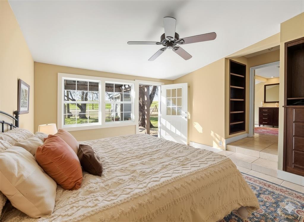 817 Edgefield Road Fort Worth, TX 76107 - Photo 10 of 15 Spacious primary bedroom with ensuite bath