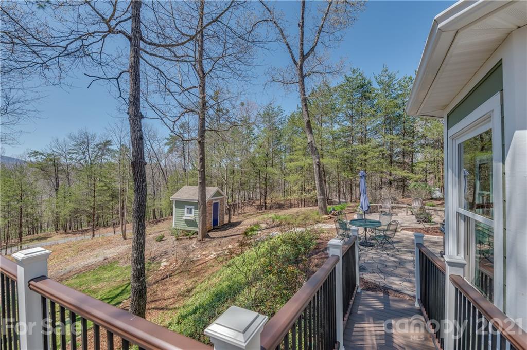 658 South Cove Road Mill Spring, NC 28756 - Photo 12 of 46 a view of a house with backyard from a balcony