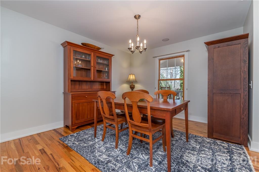 658 South Cove Road Mill Spring, NC 28756 - Photo 21 of 46 a view of a dining room with furniture
