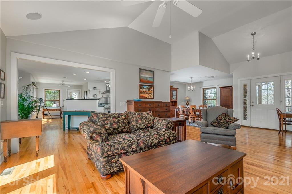 658 South Cove Road Mill Spring, NC 28756 - Photo 6 of 46 a living room with furniture and wooden floor