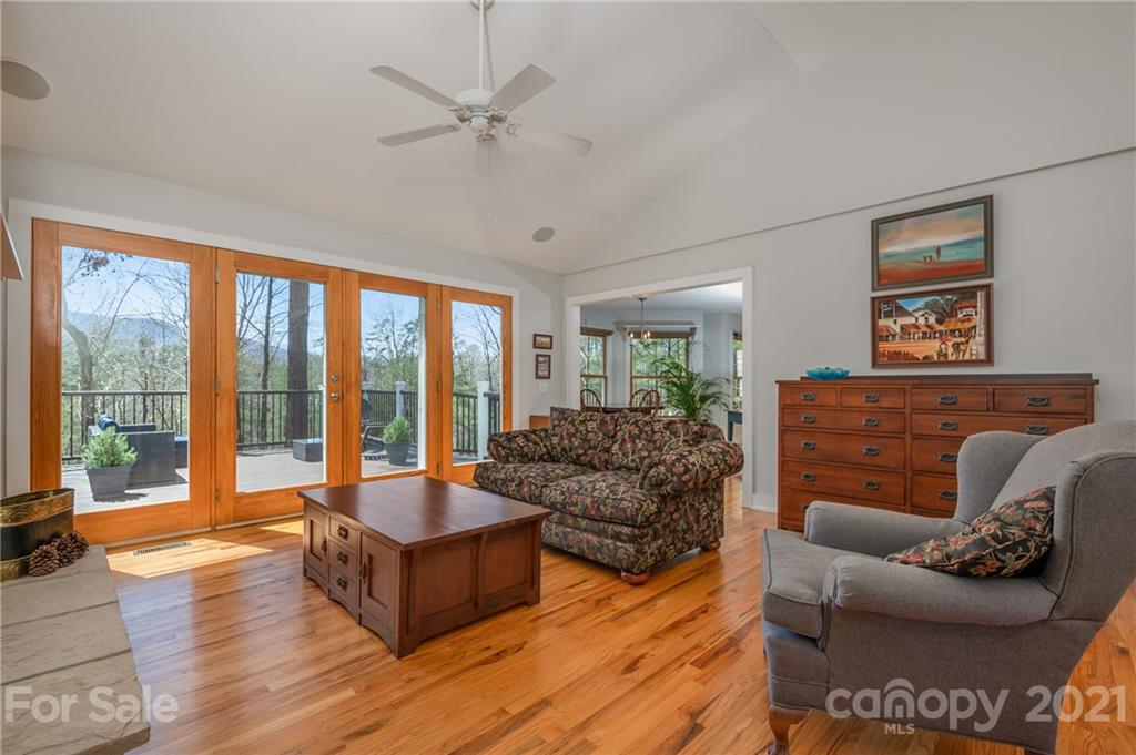 658 South Cove Road Mill Spring, NC 28756 - Photo 8 of 46 a living room with furniture and a large window