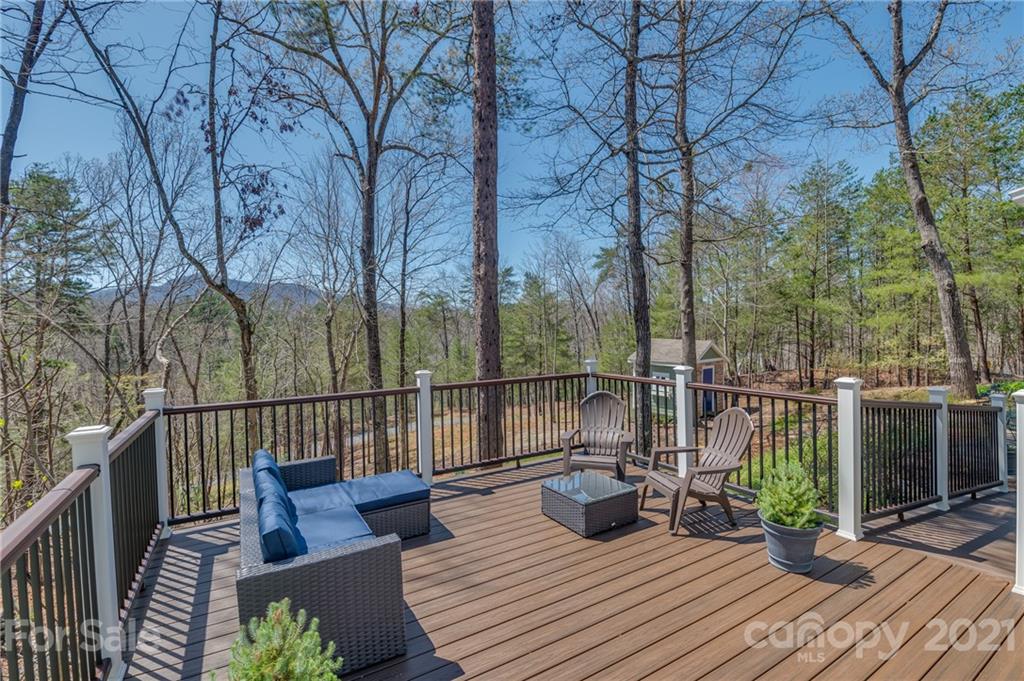 658 South Cove Road Mill Spring, NC 28756 - Photo 10 of 46 a view of a balcony with chairs
