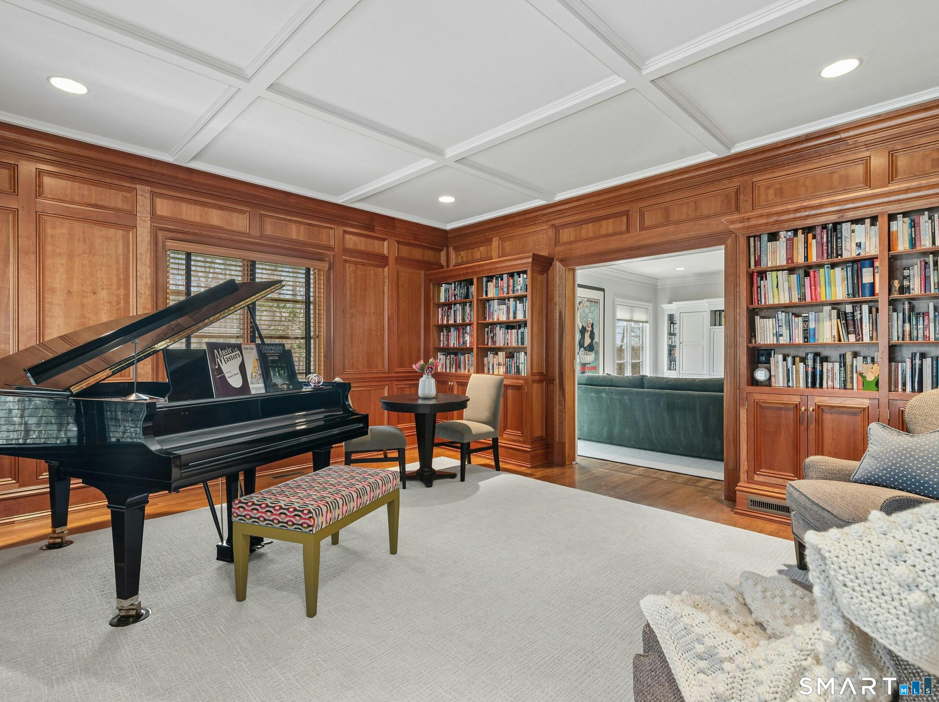 760 Smith Ridge Road New Canaan, CT 06840 - Photo 16 of 38 a living room with furniture and a wooden floor