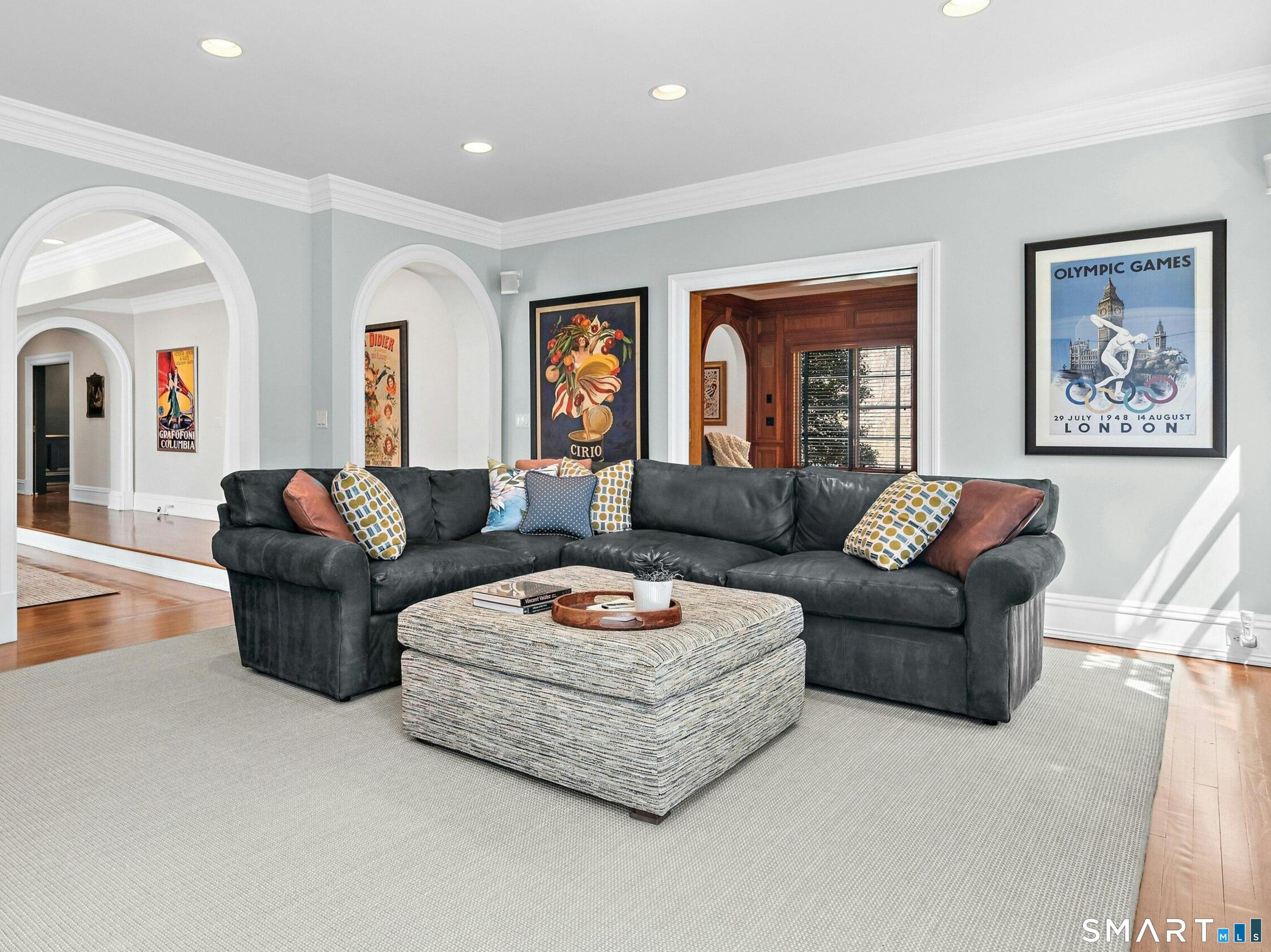 760 Smith Ridge Road New Canaan, CT 06840 - Photo 17 of 38 a living room with furniture and a large window