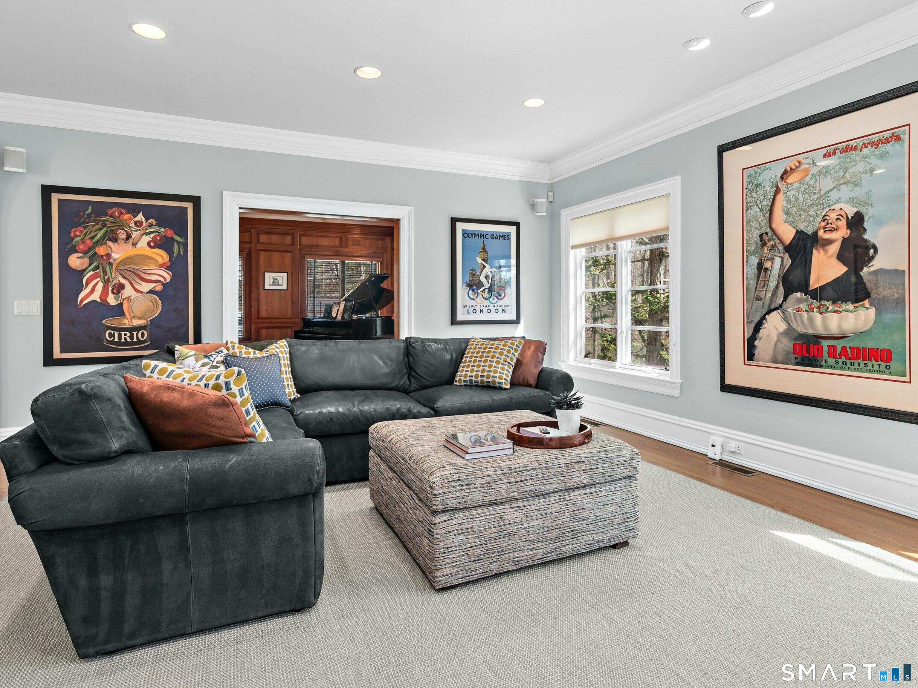 760 Smith Ridge Road New Canaan, CT 06840 - Photo 18 of 38 a living room with furniture and a large window