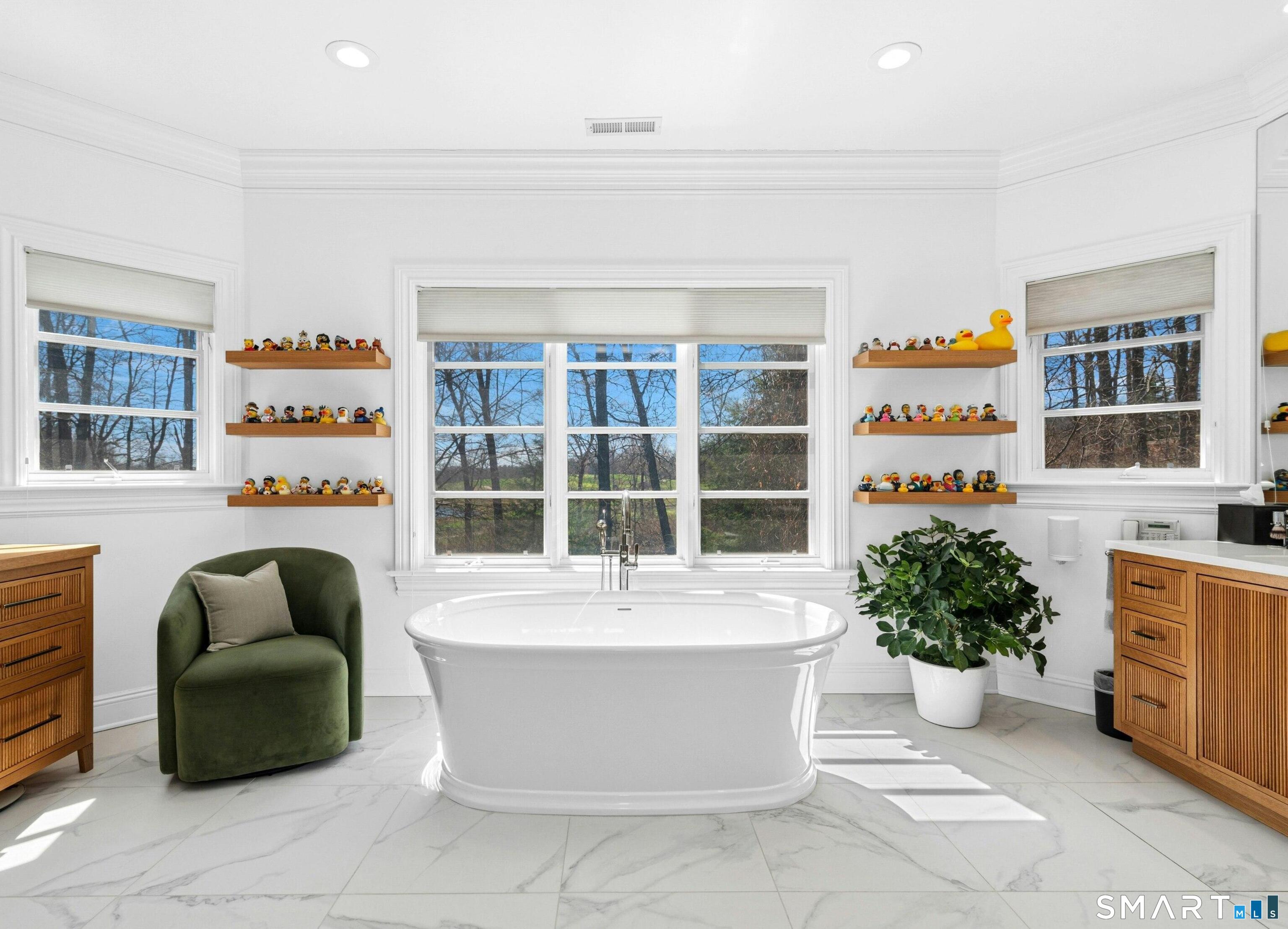 760 Smith Ridge Road New Canaan, CT 06840 - Photo 24 of 38 a living room with furniture and window