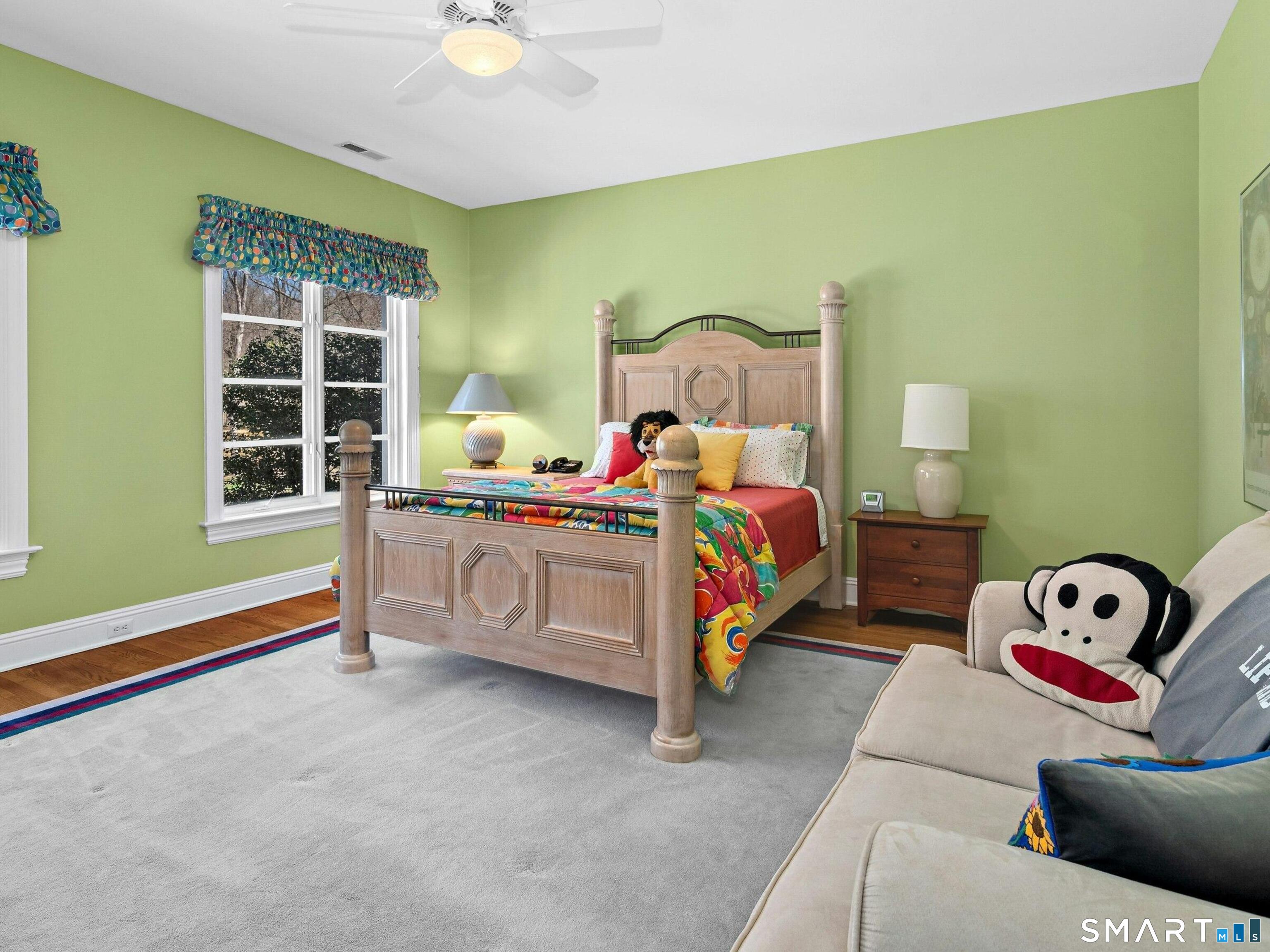 760 Smith Ridge Road New Canaan, CT 06840 - Photo 26 of 38 a bedroom with a bed and a window