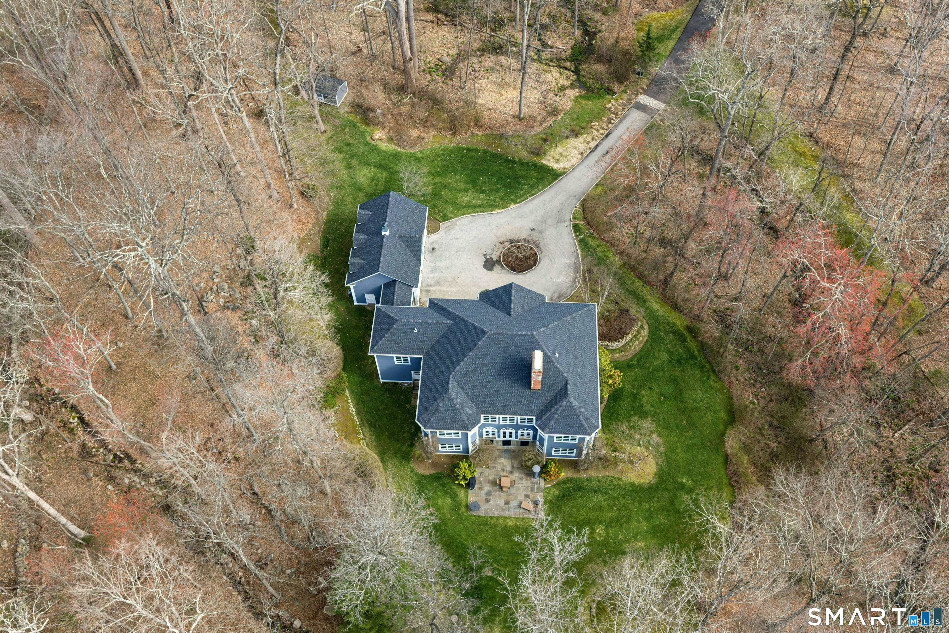 760 Smith Ridge Road New Canaan, CT 06840 - Photo 35 of 38 an aerial view of a house with outdoor space