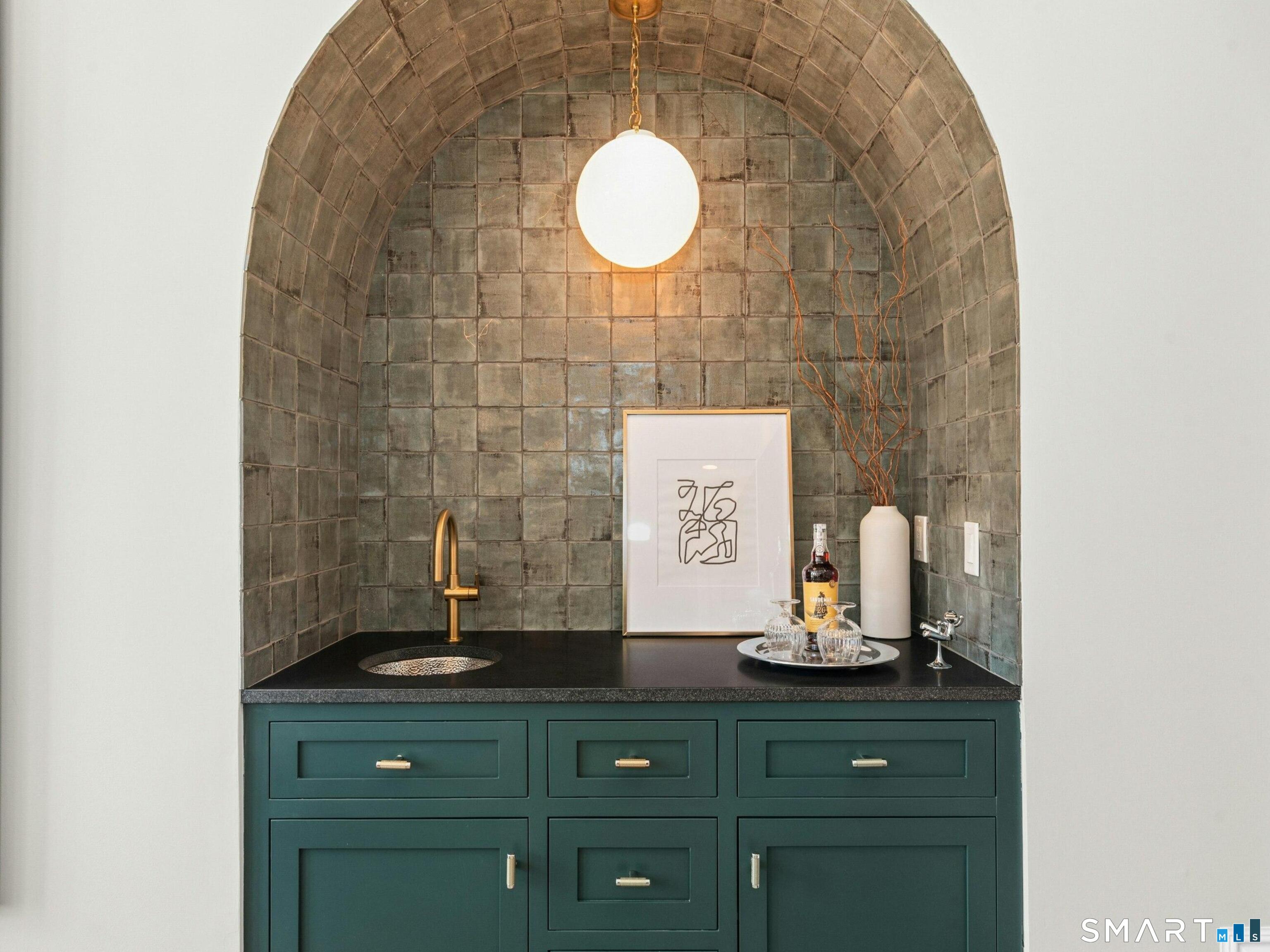 760 Smith Ridge Road New Canaan, CT 06840 - Photo 9 of 38 a bathroom with a sink and a mirror