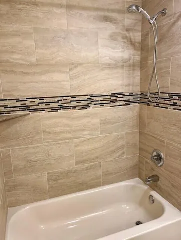 a bathroom with a bathtub