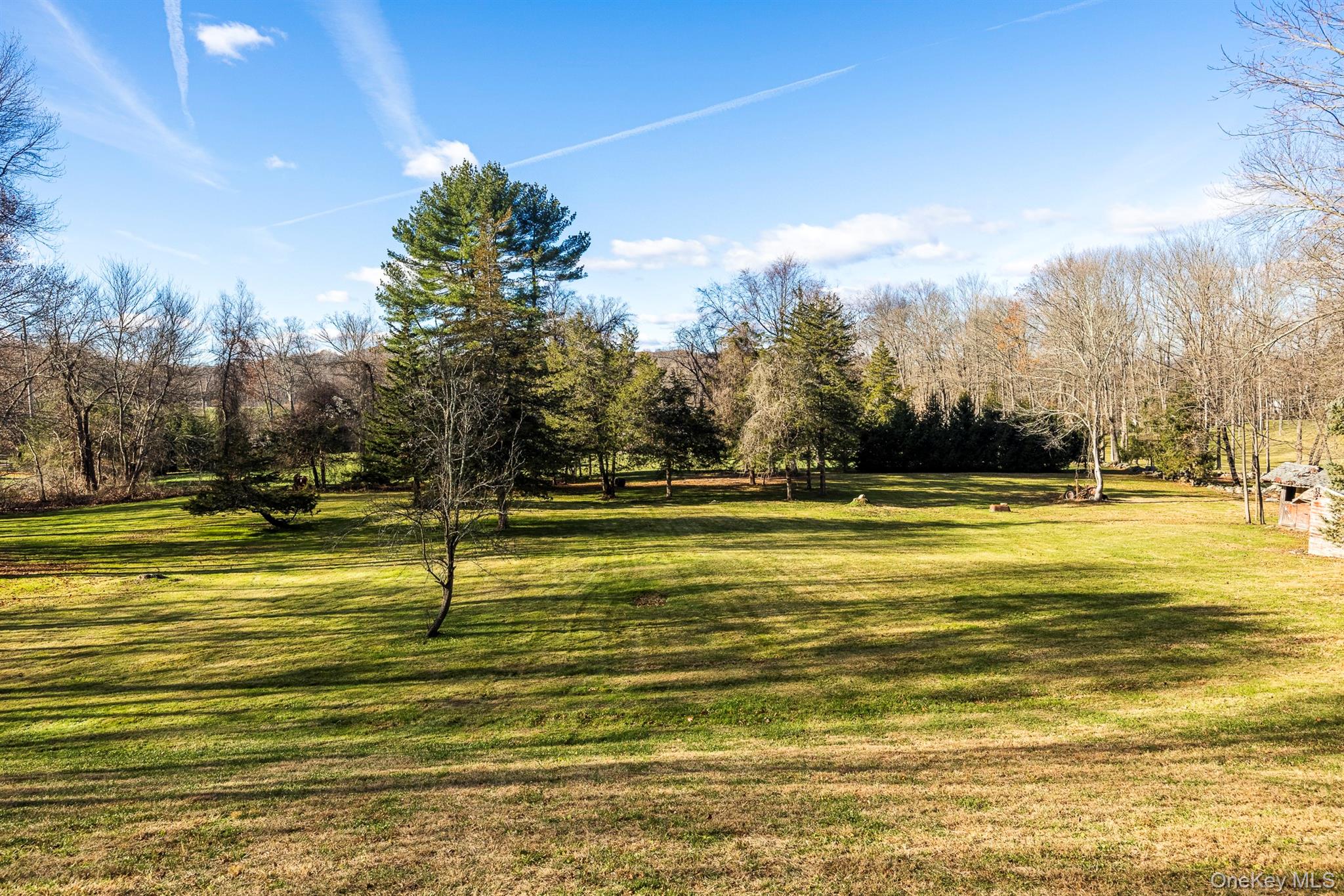 6 Star Ridge Road North Salem, NY 10560 - Photo 27 of 34 a view of swimming pool with an outdoor space and seating area