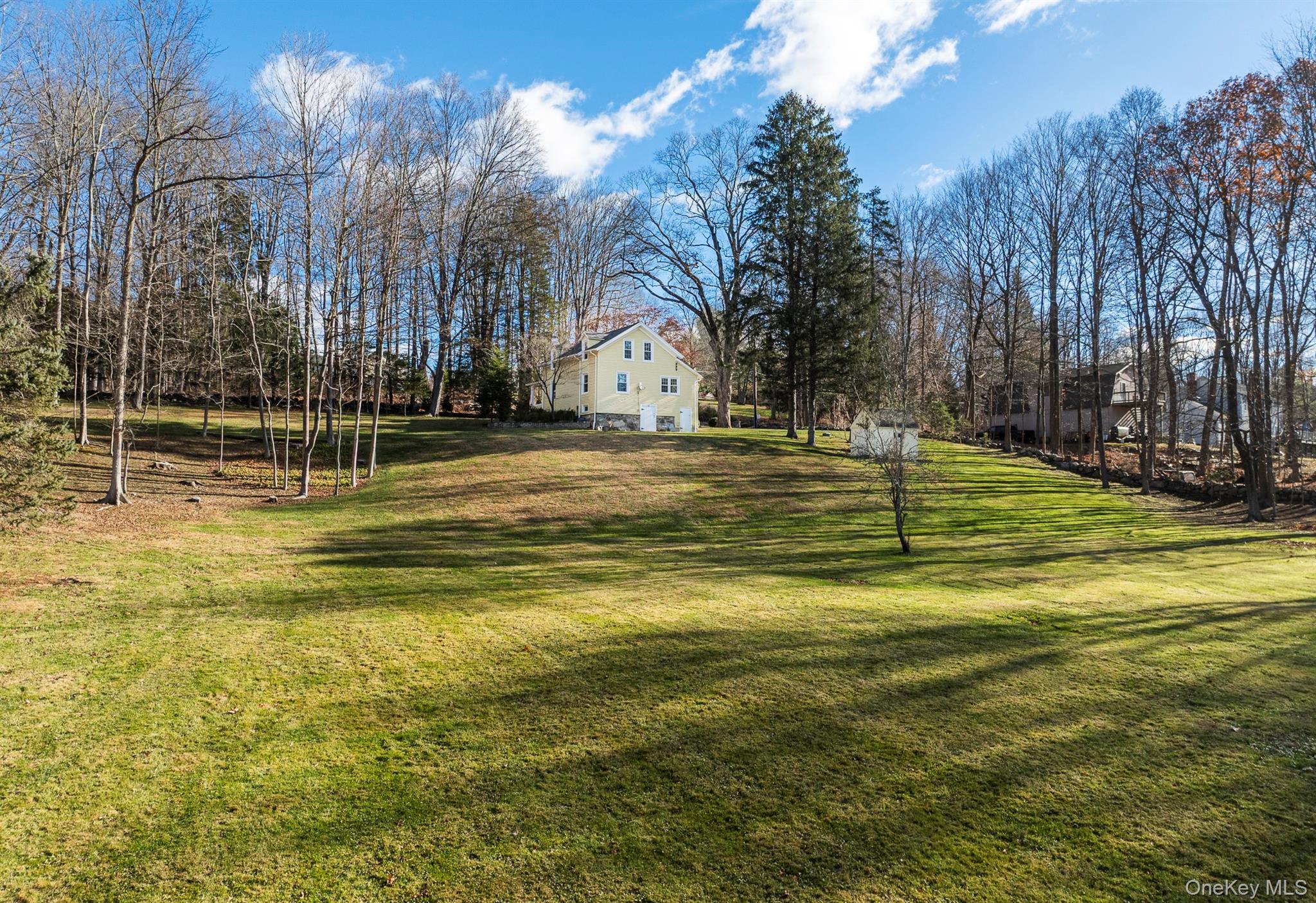 6 Star Ridge Road North Salem, NY 10560 - Photo 29 of 34 a view of a swimming pool with an outdoor space and seating area