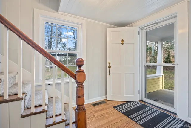 a view of an entryway with staircase