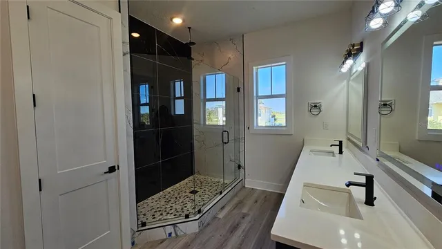 a bathroom with a sink and a mirror