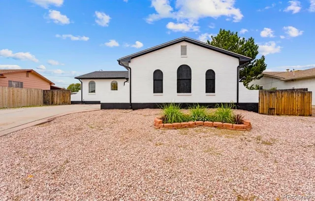 a house with a yard in front of it