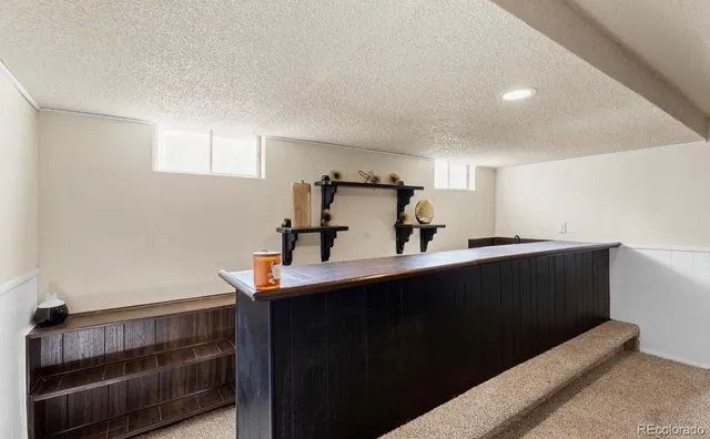 a view of a living room with furniture