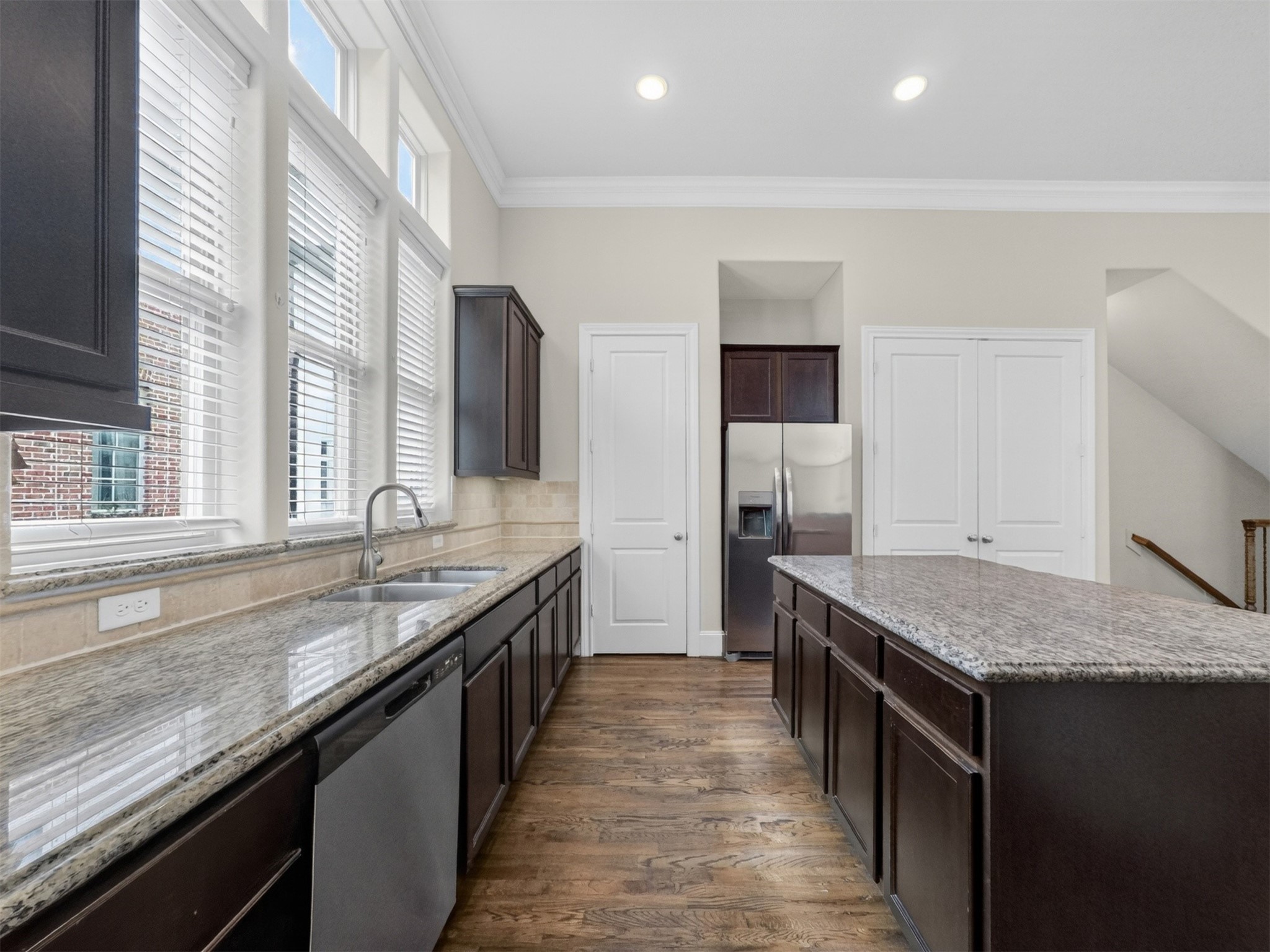2810 Capitol Street Houston, TX 77003 - Photo 15 of 33 a kitchen with granite countertop kitchen island a sink stove and granite counter top