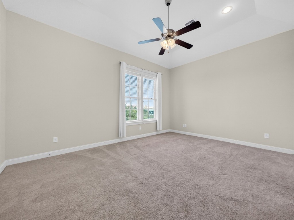 2810 Capitol Street Houston, TX 77003 - Photo 25 of 33 an empty room with a window and a fan