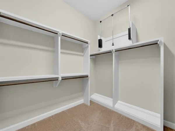 a view of an empty walk in closet