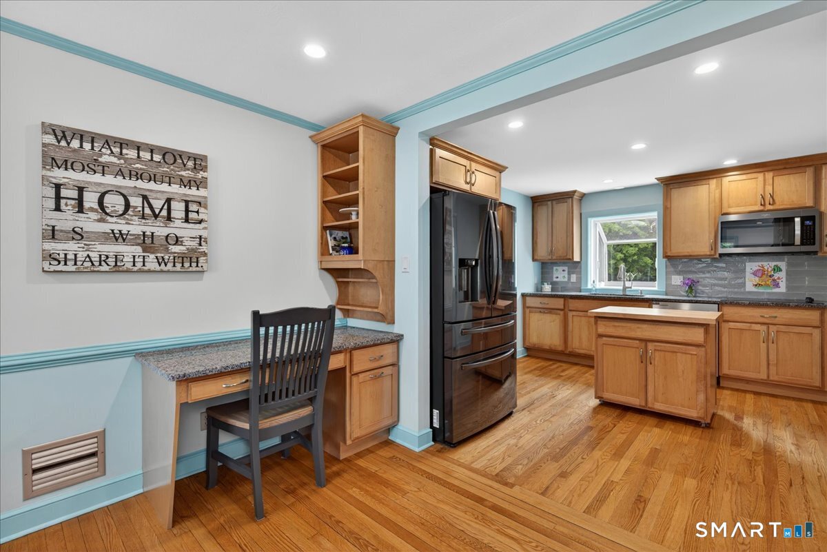 1006 King Road Cheshire, CT 06410 - Photo 3 of 40 The open concept Kitchen and Dining area was renovated in 2019. Wonderfully functional, it includes a workspace.