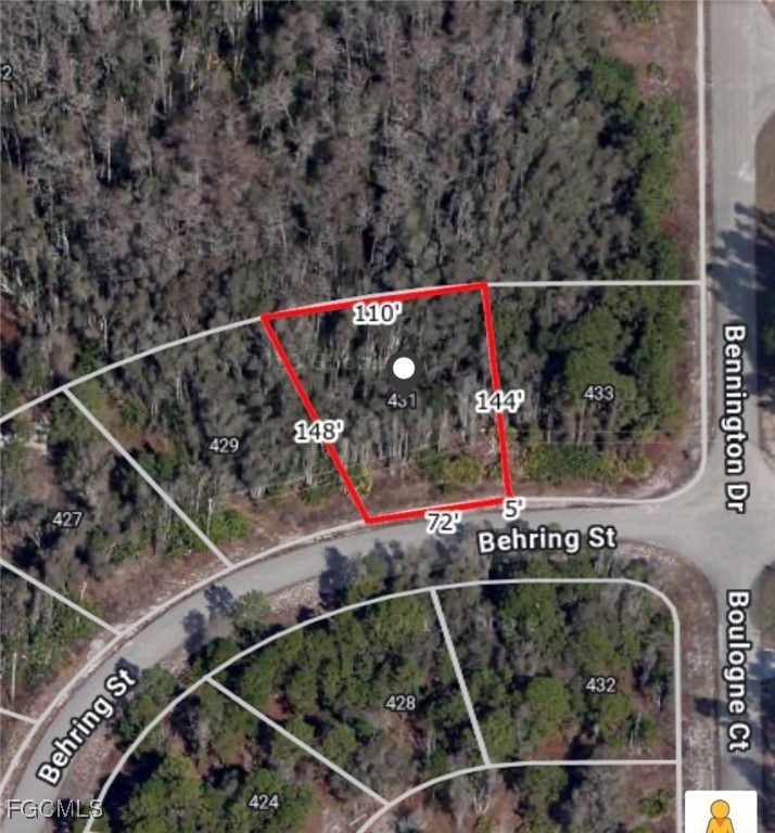 431 Behring Street Lehigh Acres, FL 33974 - Photo 1 of 3 an outdoor space with wooden floor