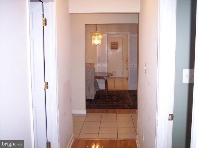 1311 Marchmont Court Reston, VA 20190 - Photo 17 of 30 Upstairs Hallway Towards Kitchen