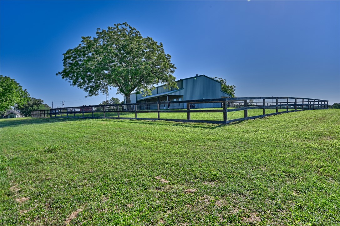 126 South Berlin Road Brenham, TX 77833 - Photo 26 of 30 a view of pool with a yard