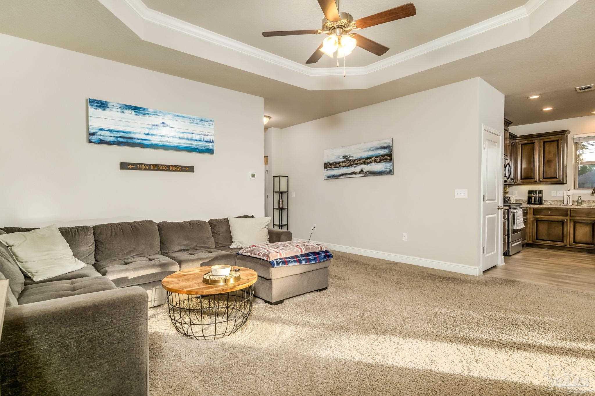 5185 Parkside Drive Pace, FL 32571 - Photo 30 of 43 a living room with furniture and a view of kitchen