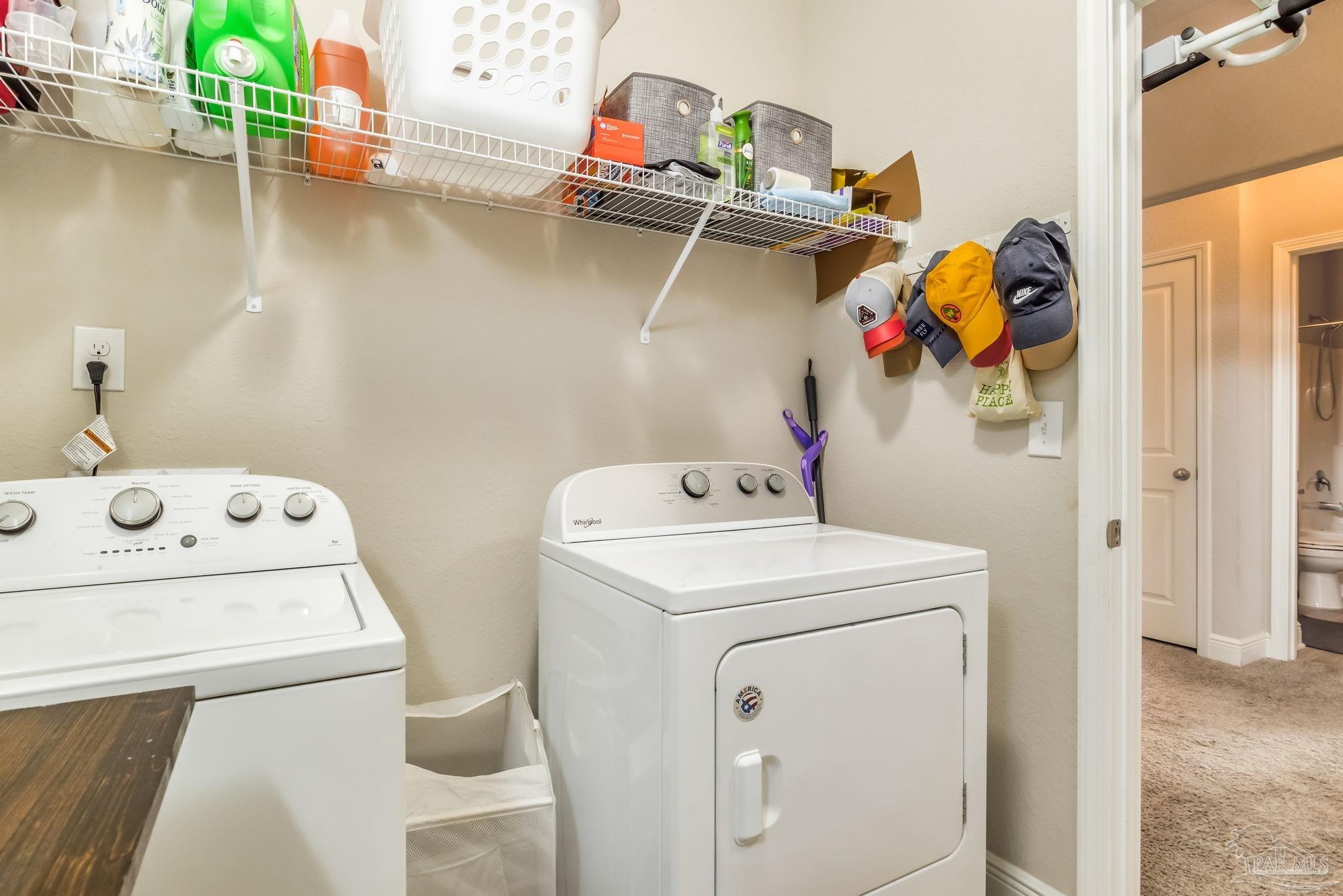 5185 Parkside Drive Pace, FL 32571 - Photo 32 of 43 a utility room with dryer and washer
