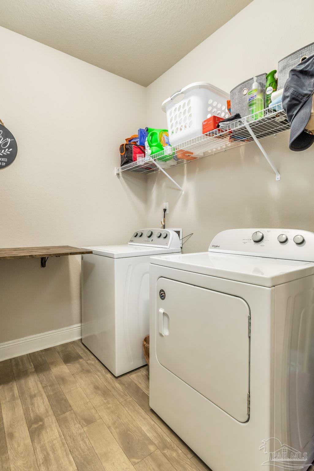 5185 Parkside Drive Pace, FL 32571 - Photo 34 of 43 a utility room with dryer and washer