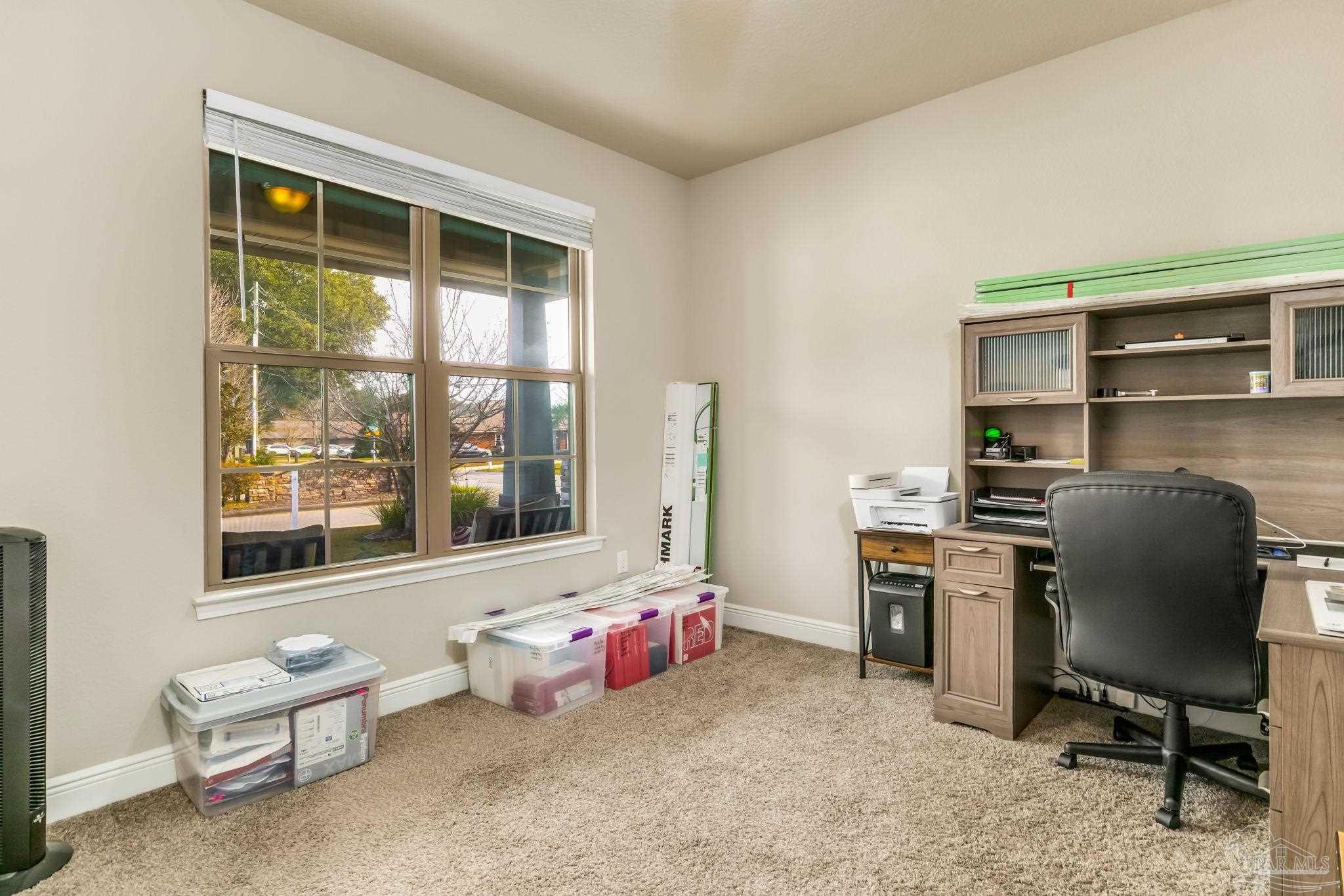 5185 Parkside Drive Pace, FL 32571 - Photo 39 of 43 a room with furniture and a window