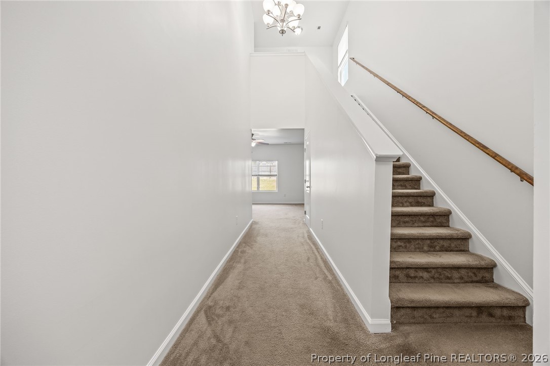 226 River Oak Street Spring Lake, NC 28390 - Photo 9 of 41 a view of a hallway with staircase