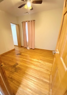 5225 West Deming Place, Unit 2 Chicago, IL 60639 - Photo 19 of 29 a view of an empty room with window