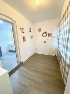 5225 West Deming Place, Unit 2 Chicago, IL 60639 - Photo 23 of 29 a view of a livingroom with wooden floor and staircase