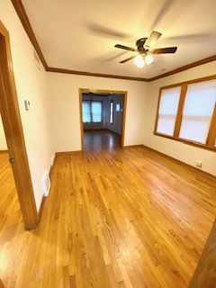 5225 West Deming Place, Unit 2 Chicago, IL 60639 - Photo 5 of 29 a view of an empty room with a window