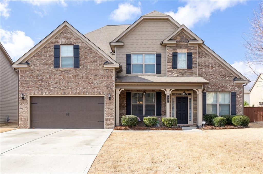 79 Gray Trail Acworth, GA 30101 - Photo 1 of 40 a front view of a house with yard