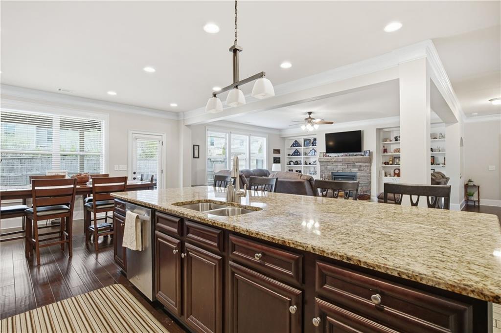 79 Gray Trail Acworth, GA 30101 - Photo 15 of 40 a kitchen with lots of counter space and painting on the wall