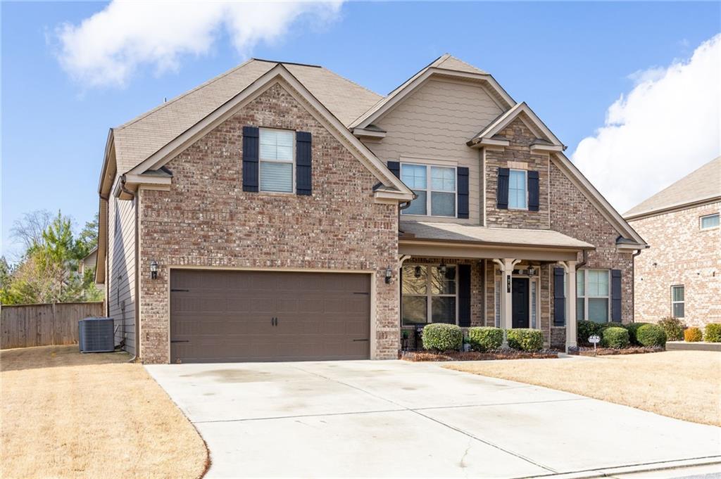 79 Gray Trail Acworth, GA 30101 - Photo 5 of 40 a front view of a house with yard