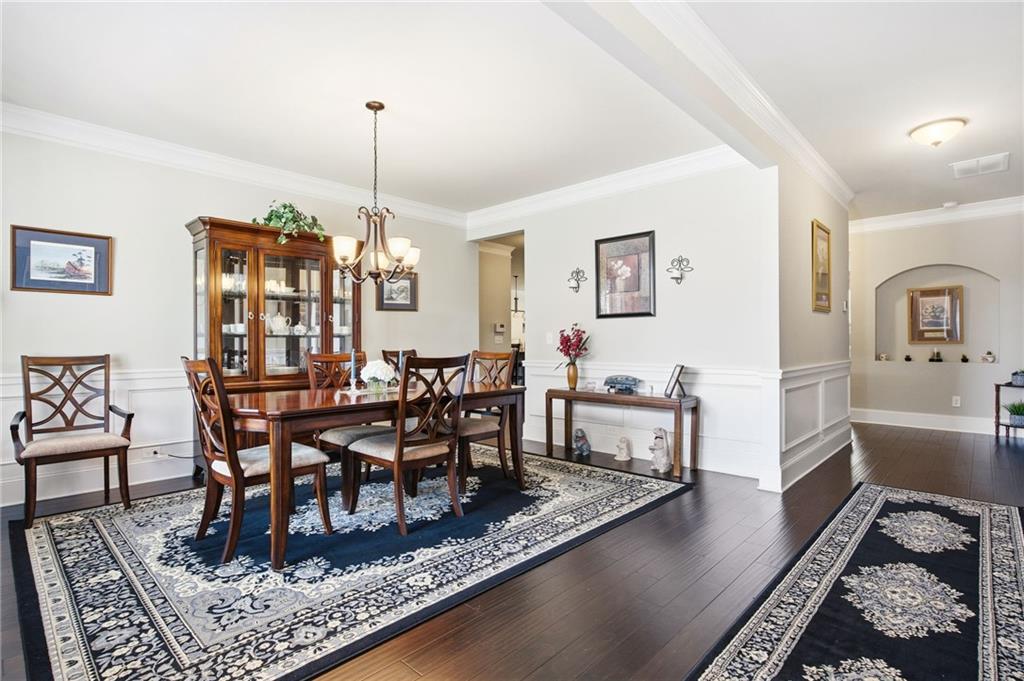 79 Gray Trail Acworth, GA 30101 - Photo 7 of 40 a dining room with furniture window and wooden floor