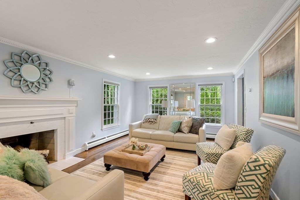 850 Boston Post Road Weston, MA 02493 - Photo 11 of 29 a living room with furniture and a large window