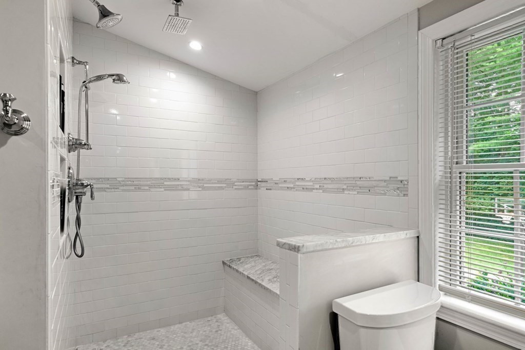 850 Boston Post Road Weston, MA 02493 - Photo 14 of 29 a bathroom with a toilet and a shower